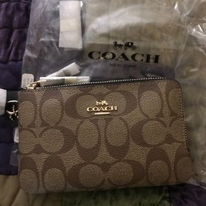 Coach double pocket wristlet, cell phone pocket